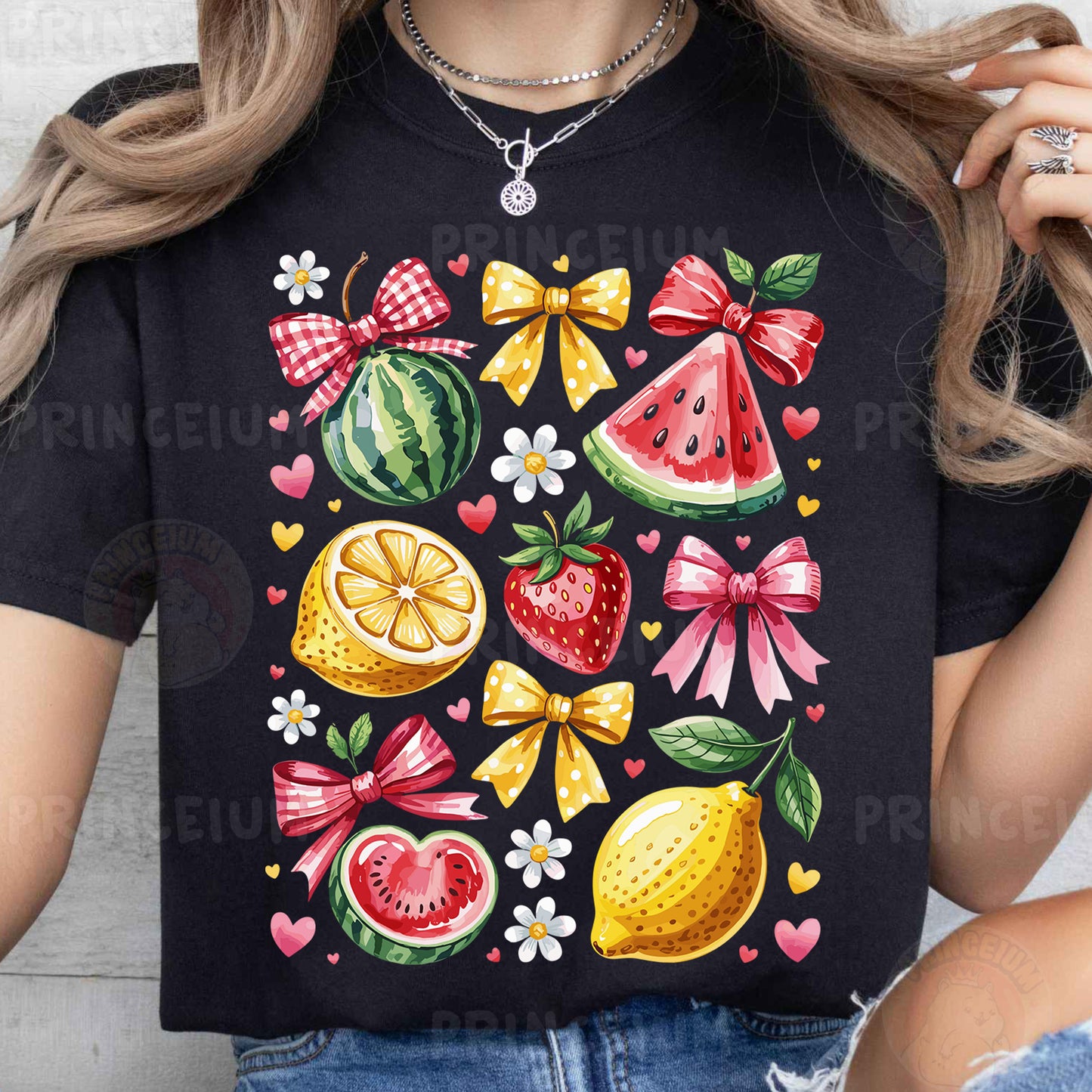 a woman wearing a black t - shirt with fruit and flowers on it