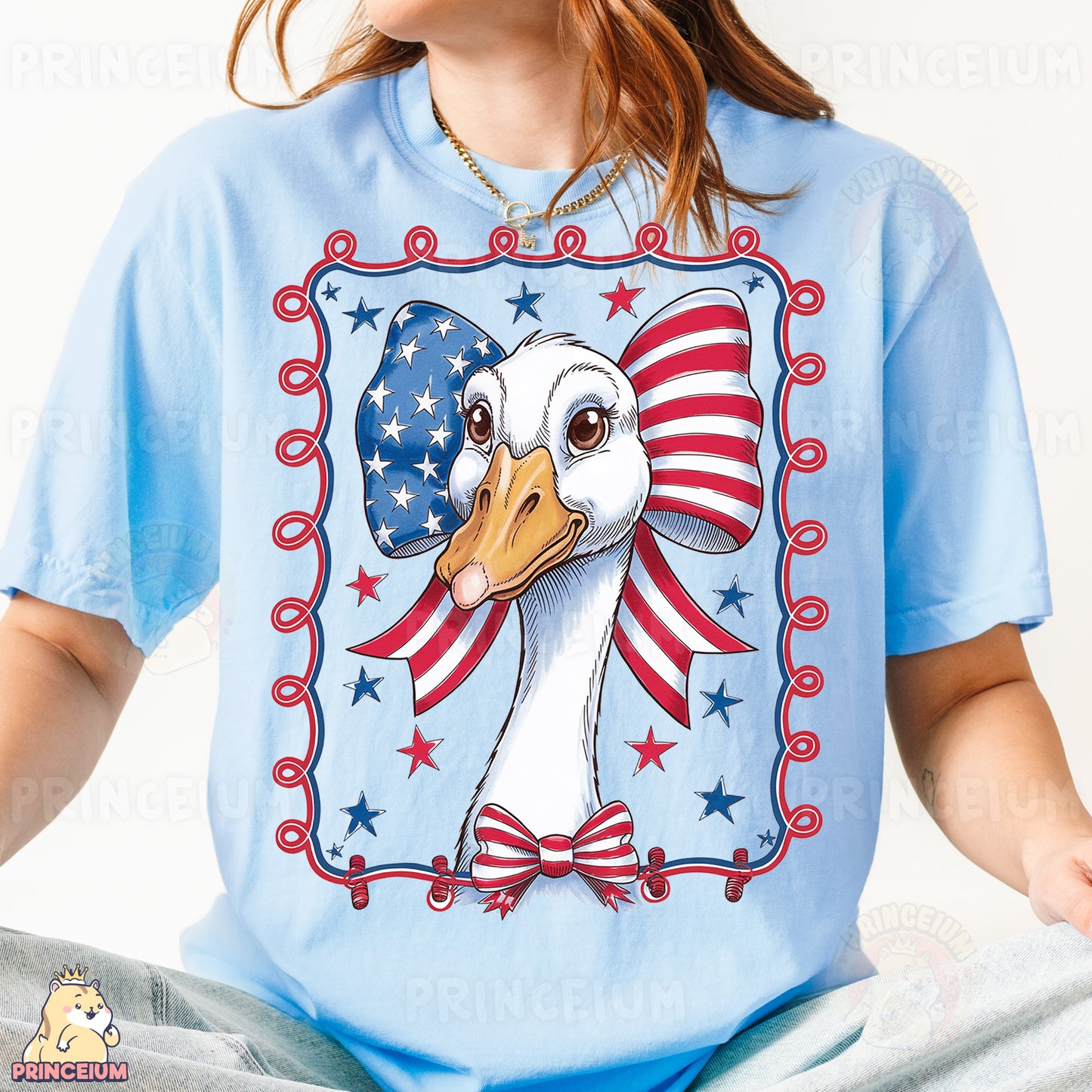 a woman wearing a blue shirt with a picture of a duck on it