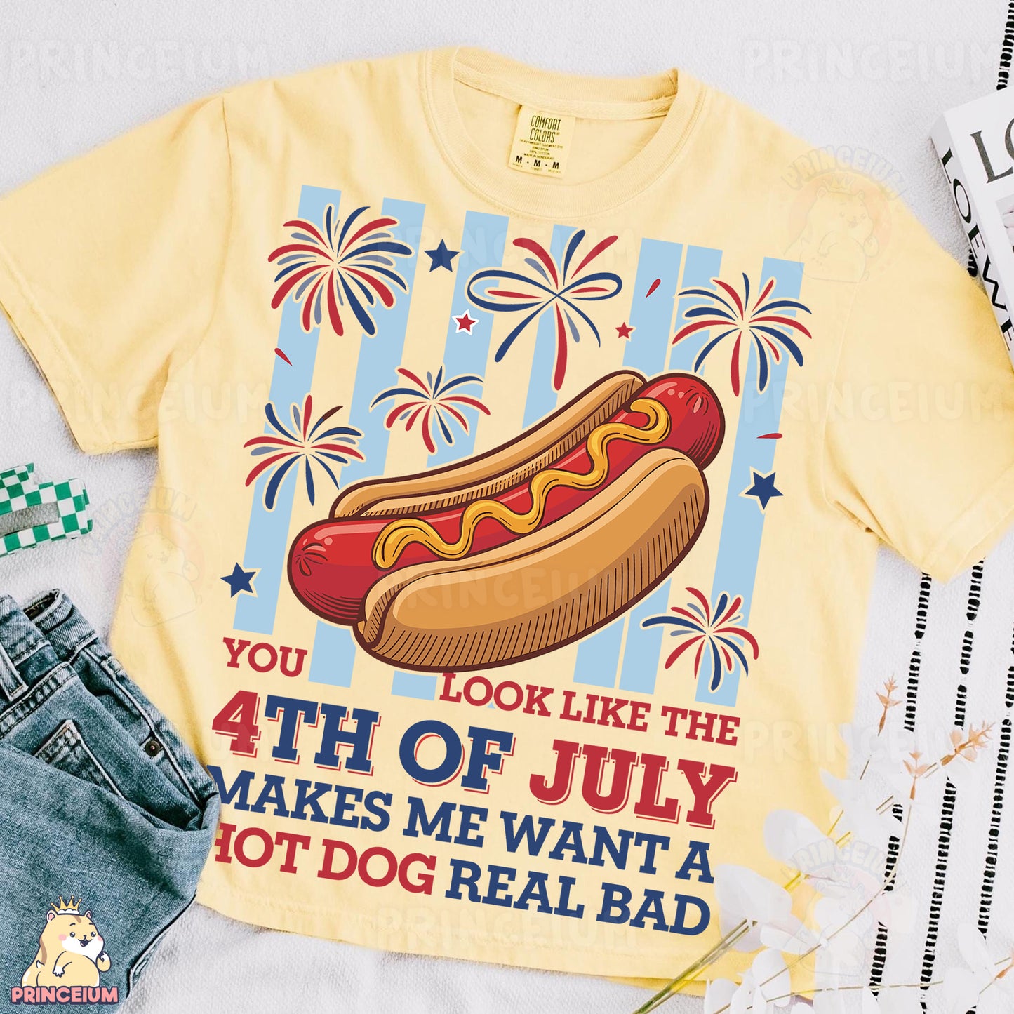 a yellow shirt with a hot dog on it
