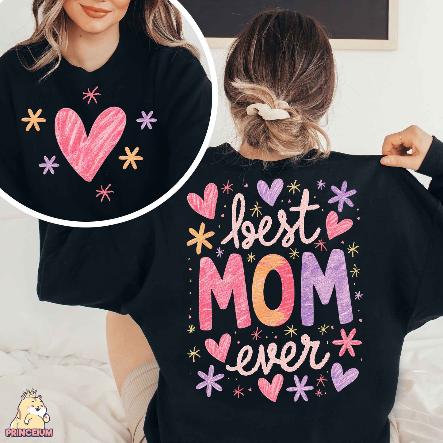 a woman wearing a black sweatshirt with the words best mom ever printed on it
