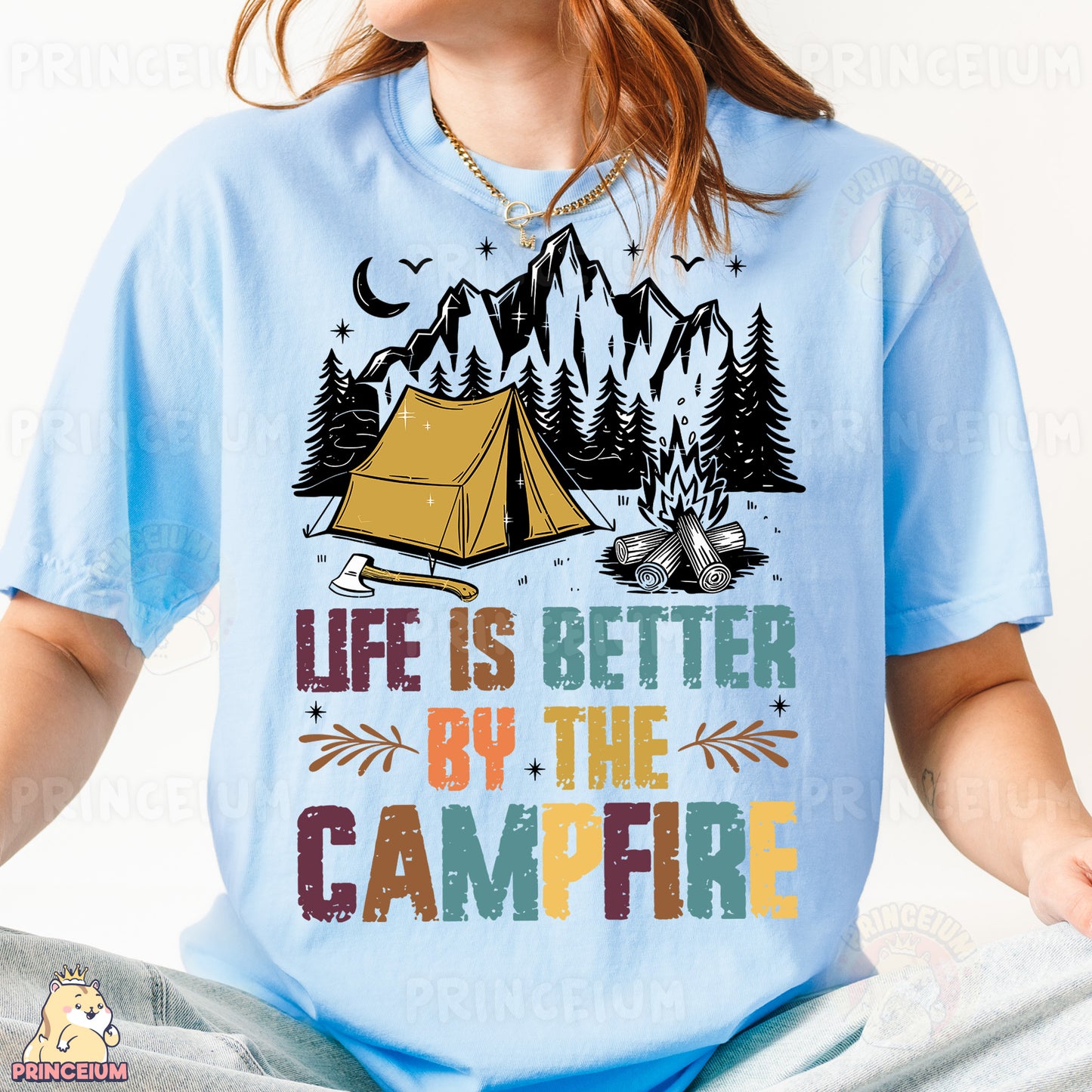 a woman wearing a t - shirt that says life is better by the campfire