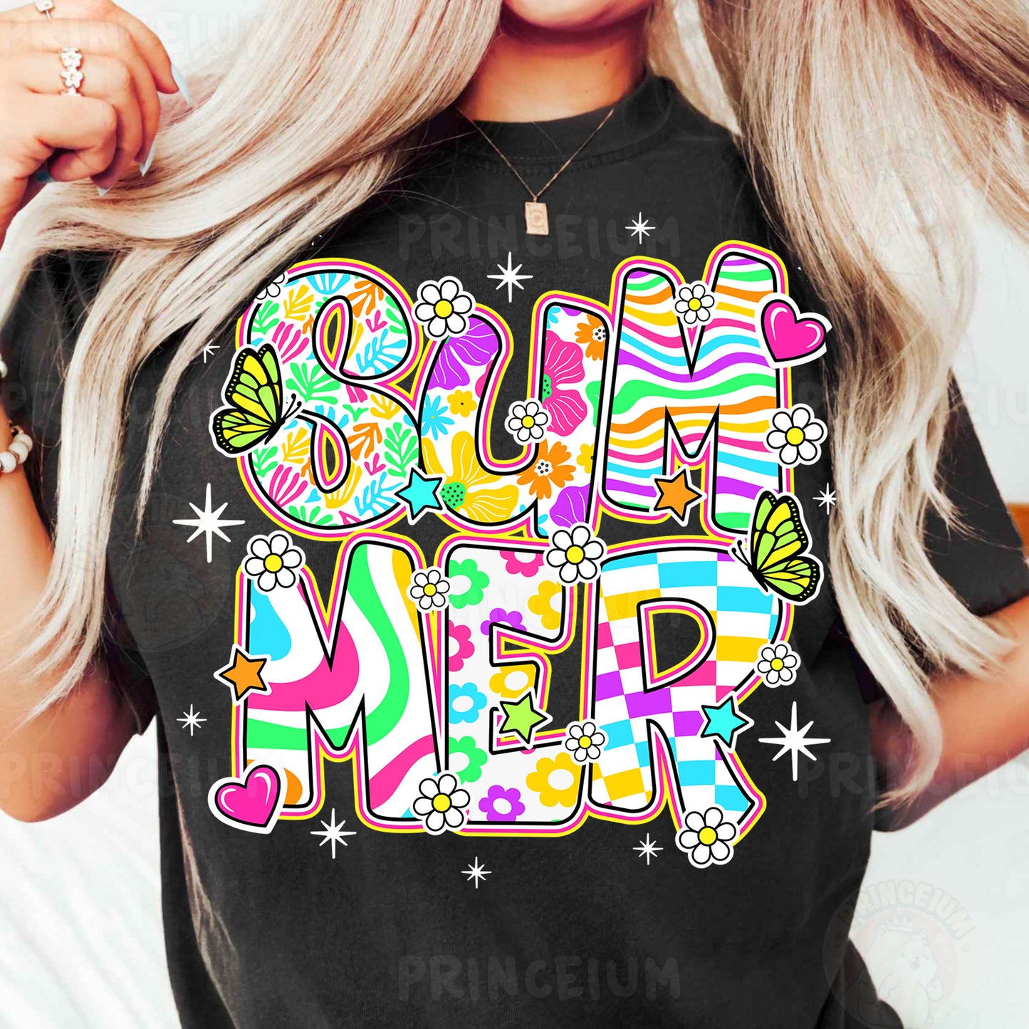 a woman wearing a black t - shirt with the word love me in colorful letters