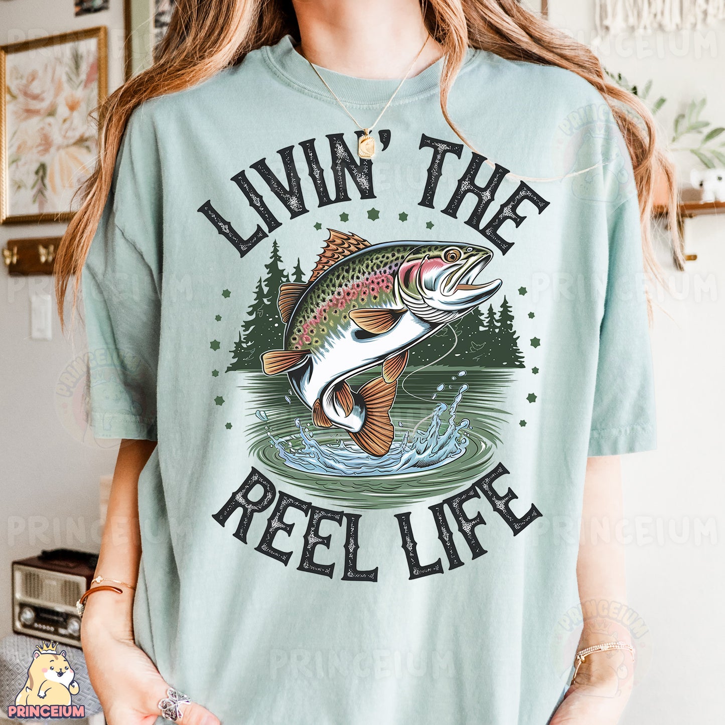a woman wearing a t - shirt that says livin the reel life