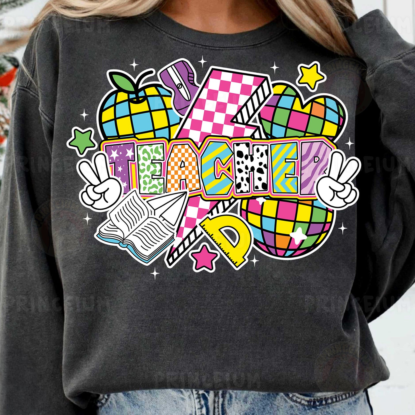 a woman wearing a black sweatshirt with a colorful graphic on it