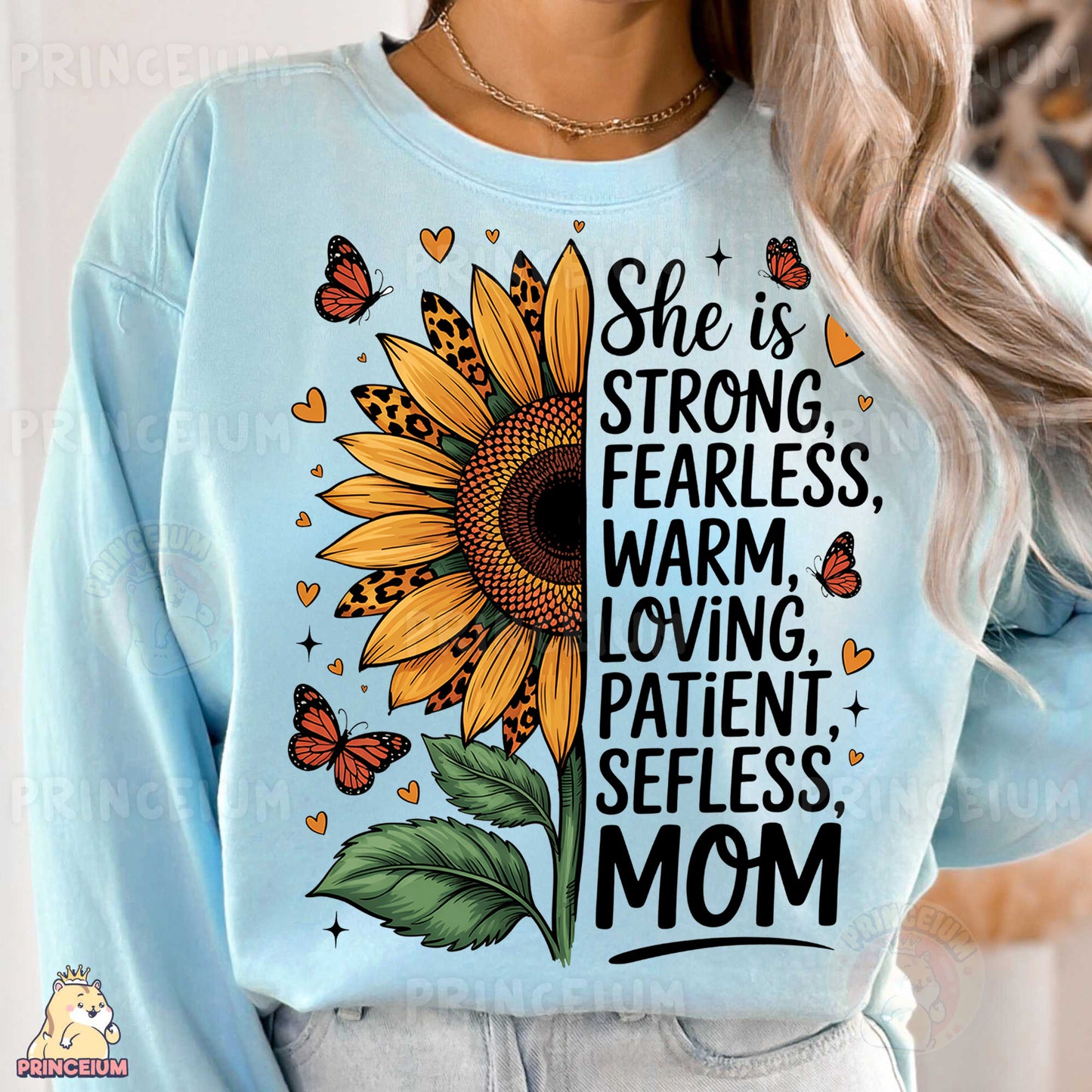 a woman wearing a blue sweatshirt with a sunflower on it