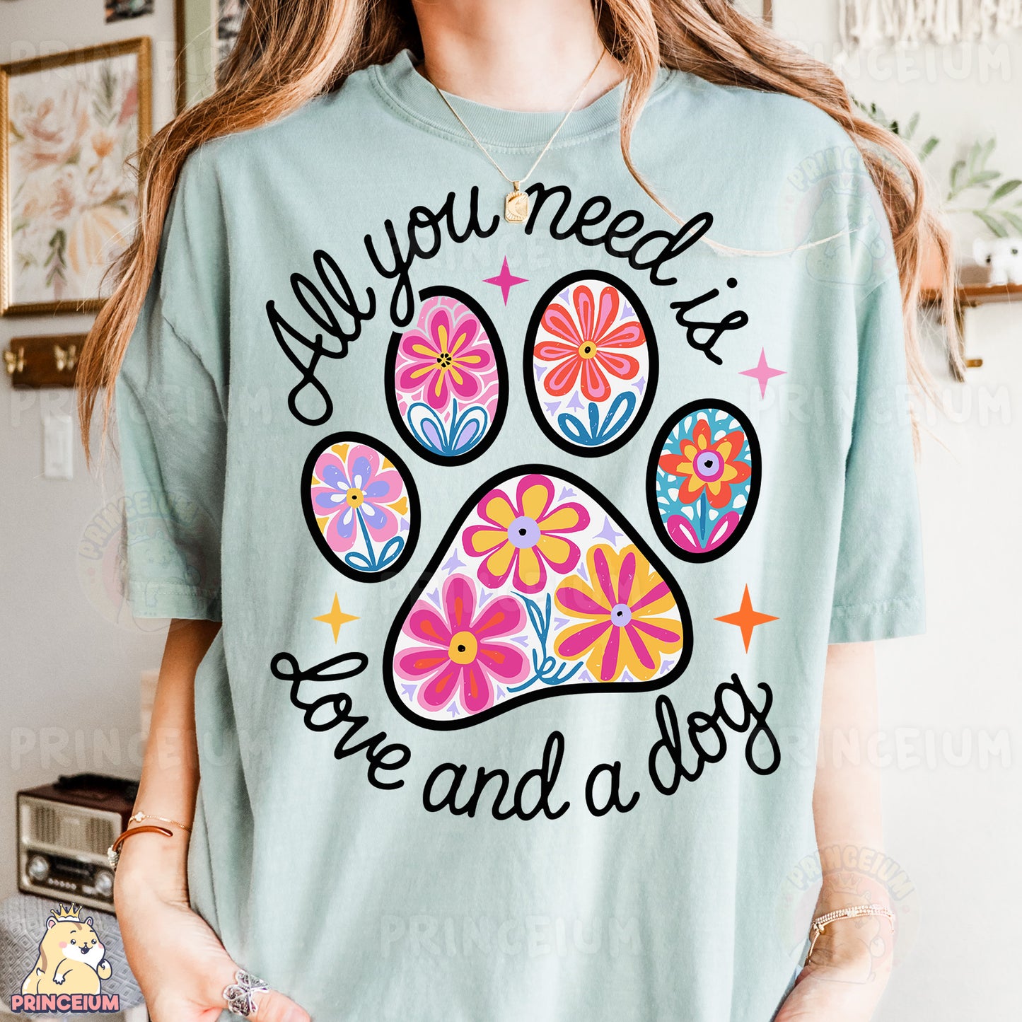 a woman wearing a t - shirt with a dog paw on it