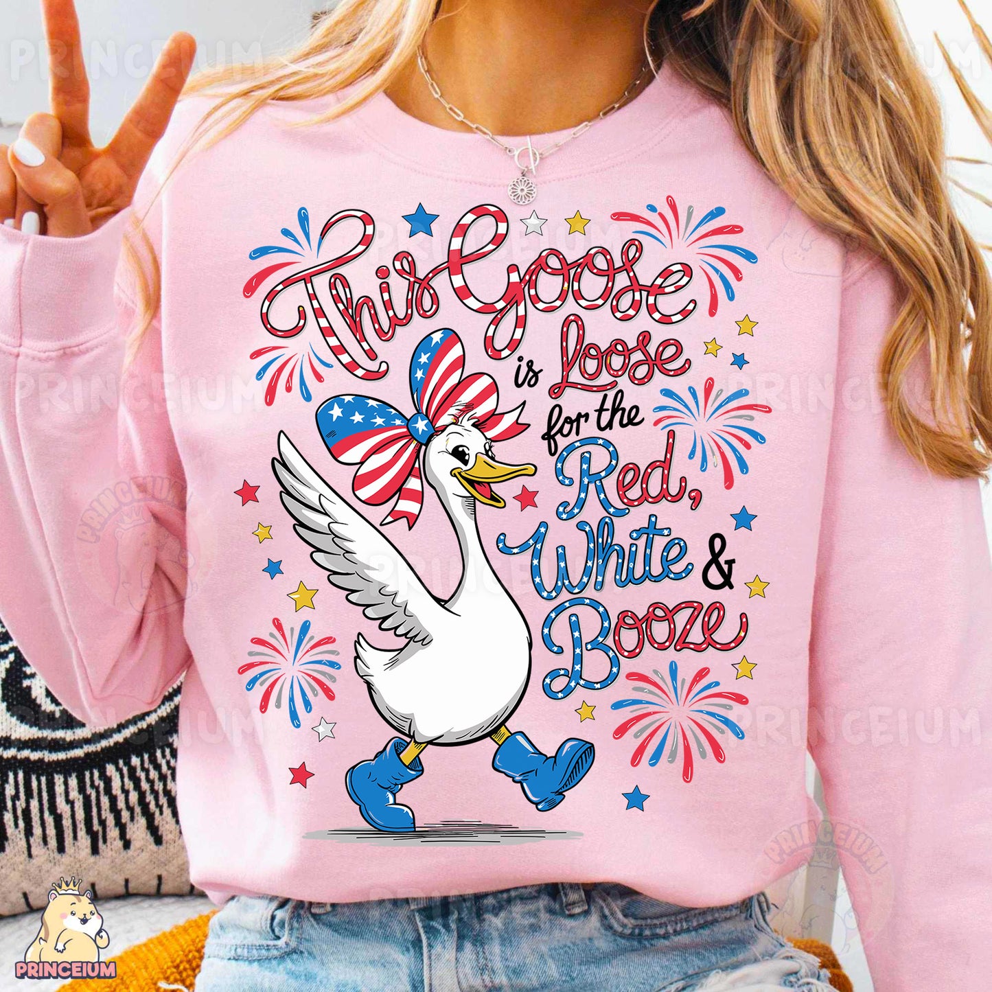 a woman wearing a pink shirt with a goose on it