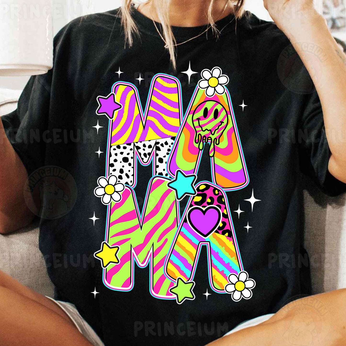 a woman sitting on a couch wearing a black m shirt