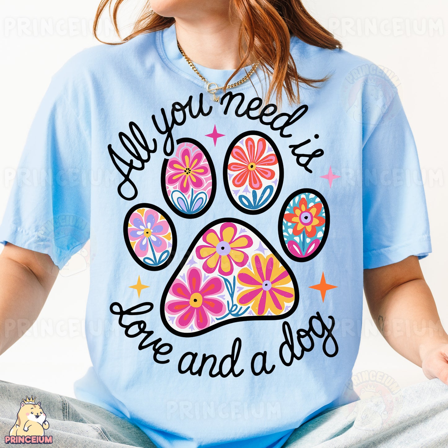 a woman wearing a t - shirt with a dog's paw on it