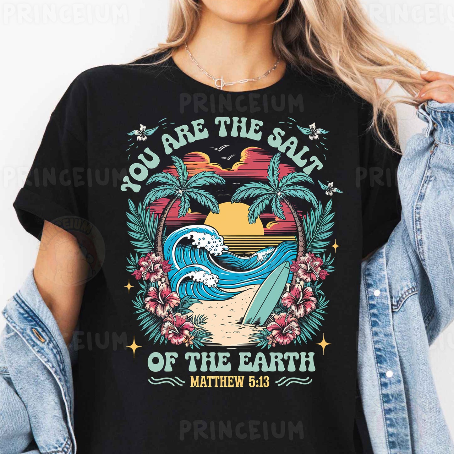 a woman wearing a black t - shirt that says you are the salt of the