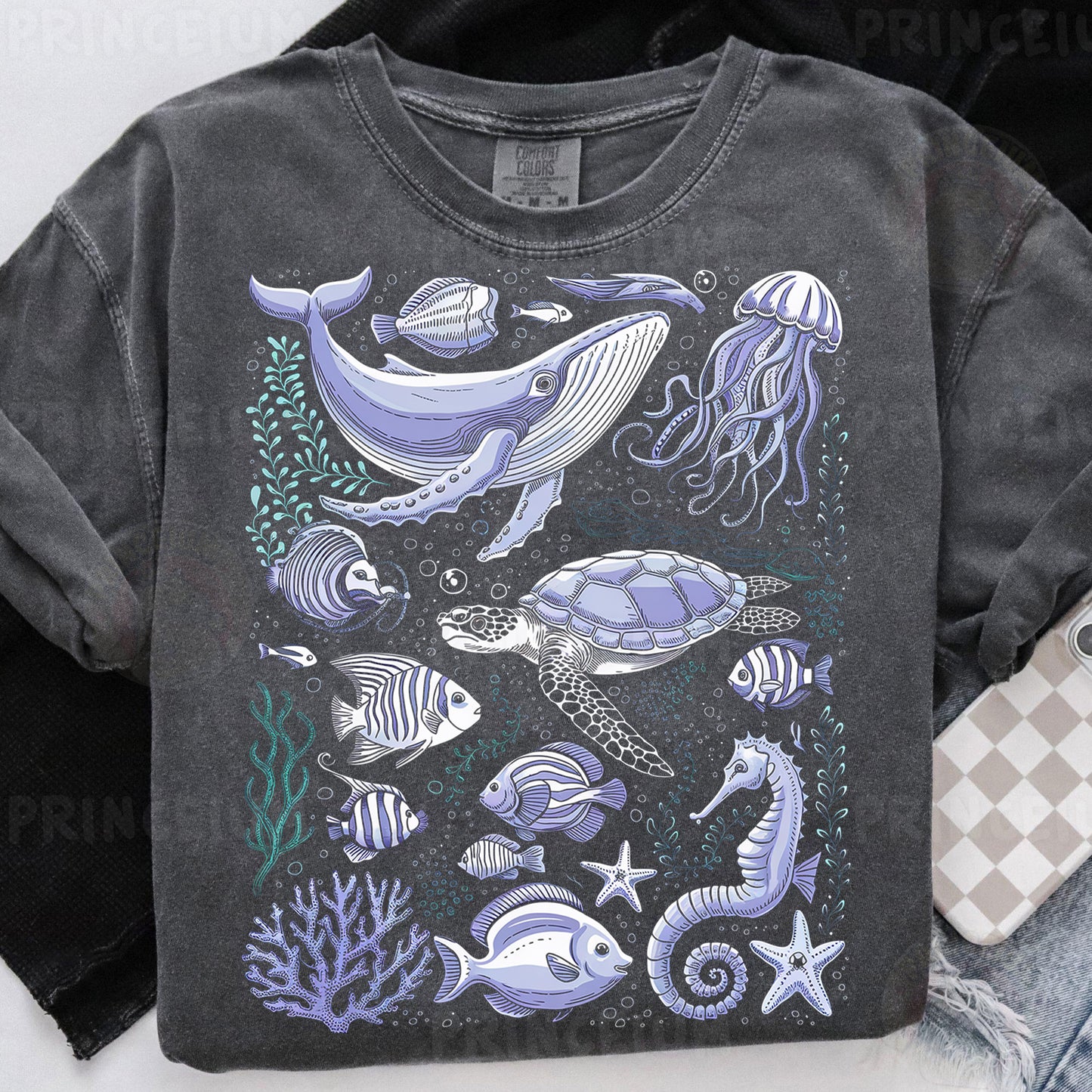 a t - shirt with an image of a sea turtle and other sea animals