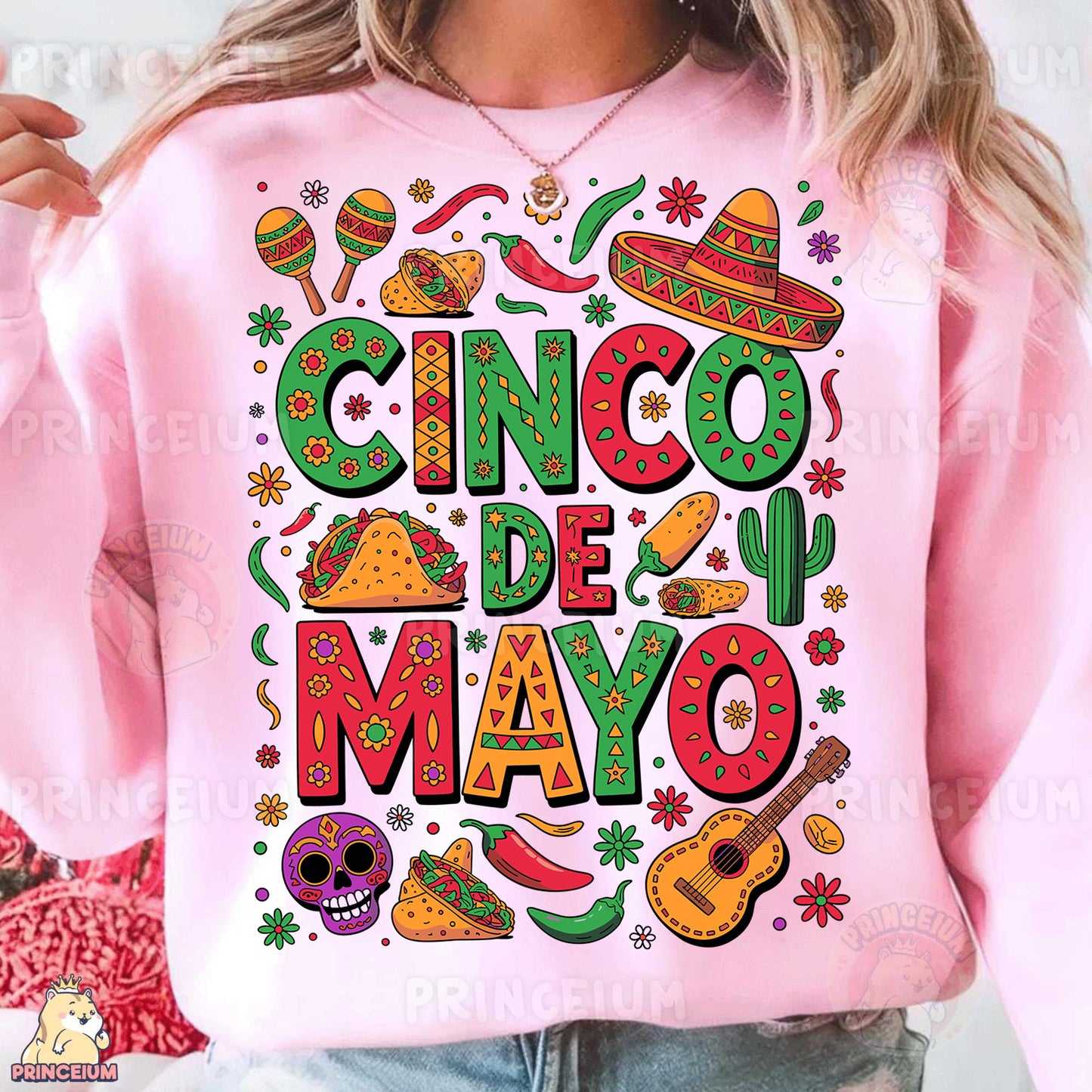 a woman wearing a pink cinco de mayo sweatshirt