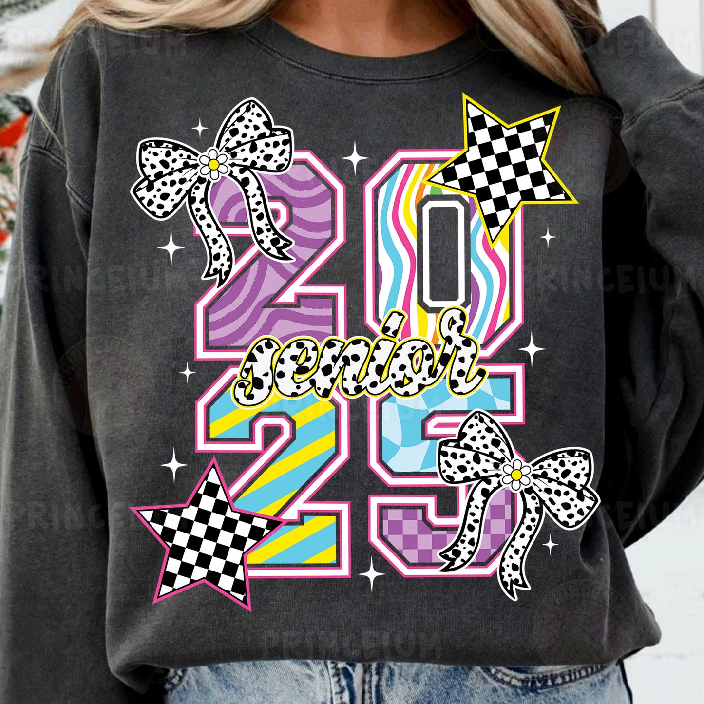 a woman wearing a black shirt with a colorful graphic on it