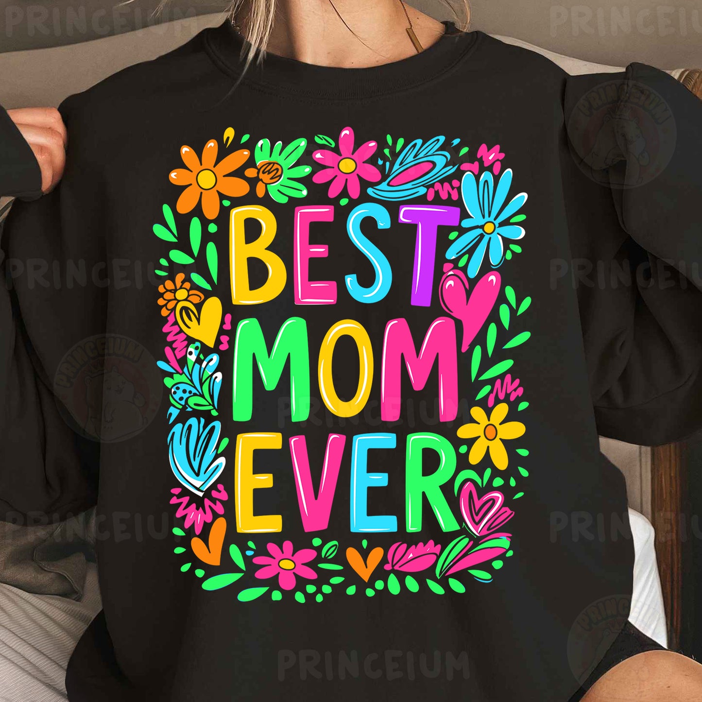 a woman wearing a black best mom ever sweatshirt