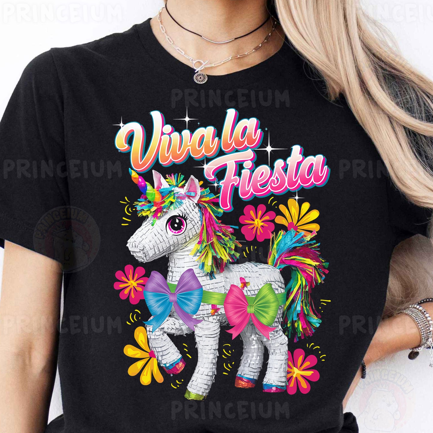 a woman wearing a black shirt with a unicorn on it
