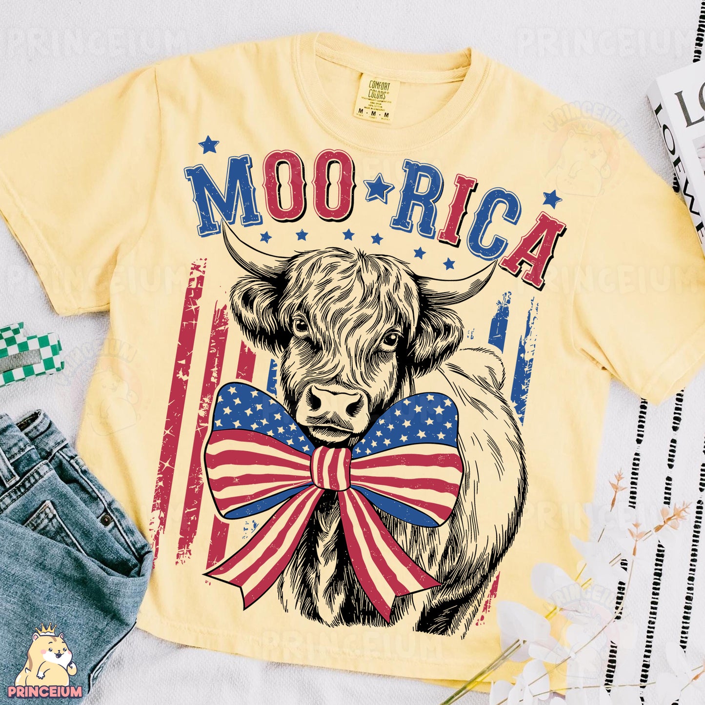 a yellow shirt with a cow wearing a bow tie