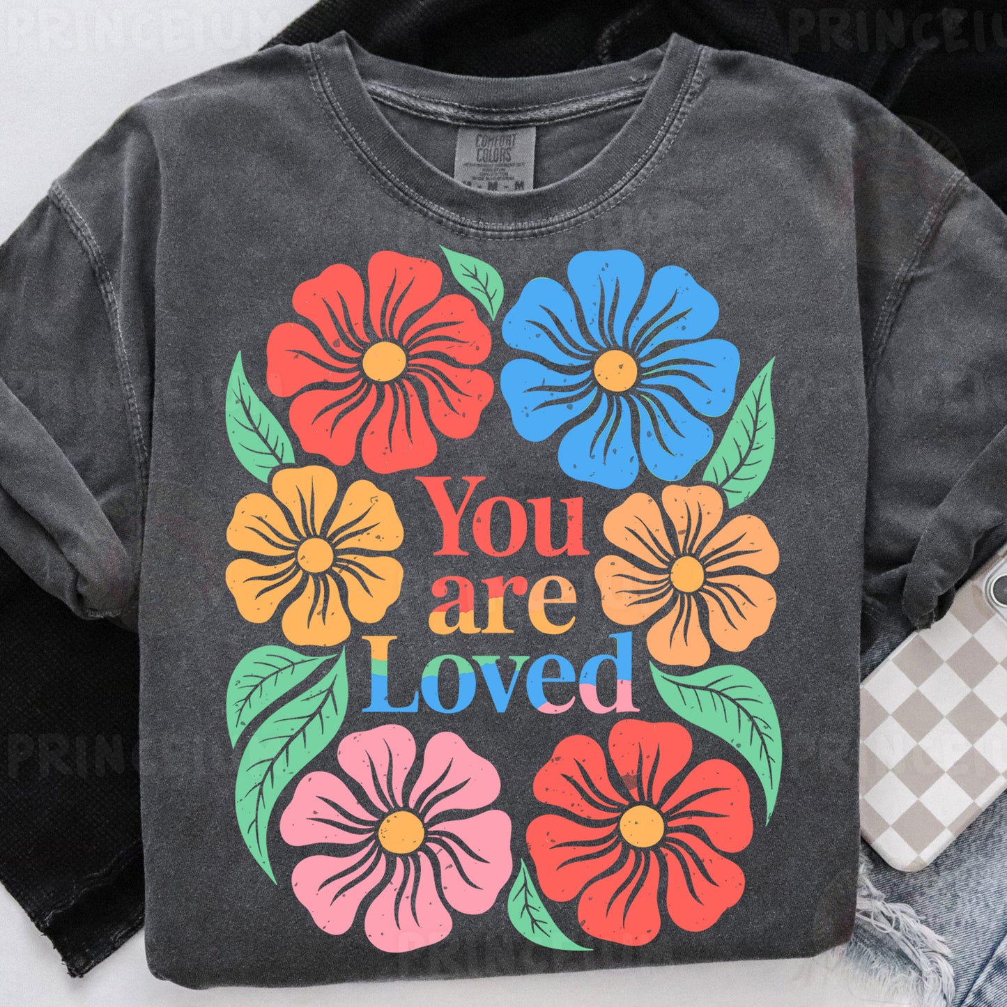 a t - shirt that says you are loved with flowers on it