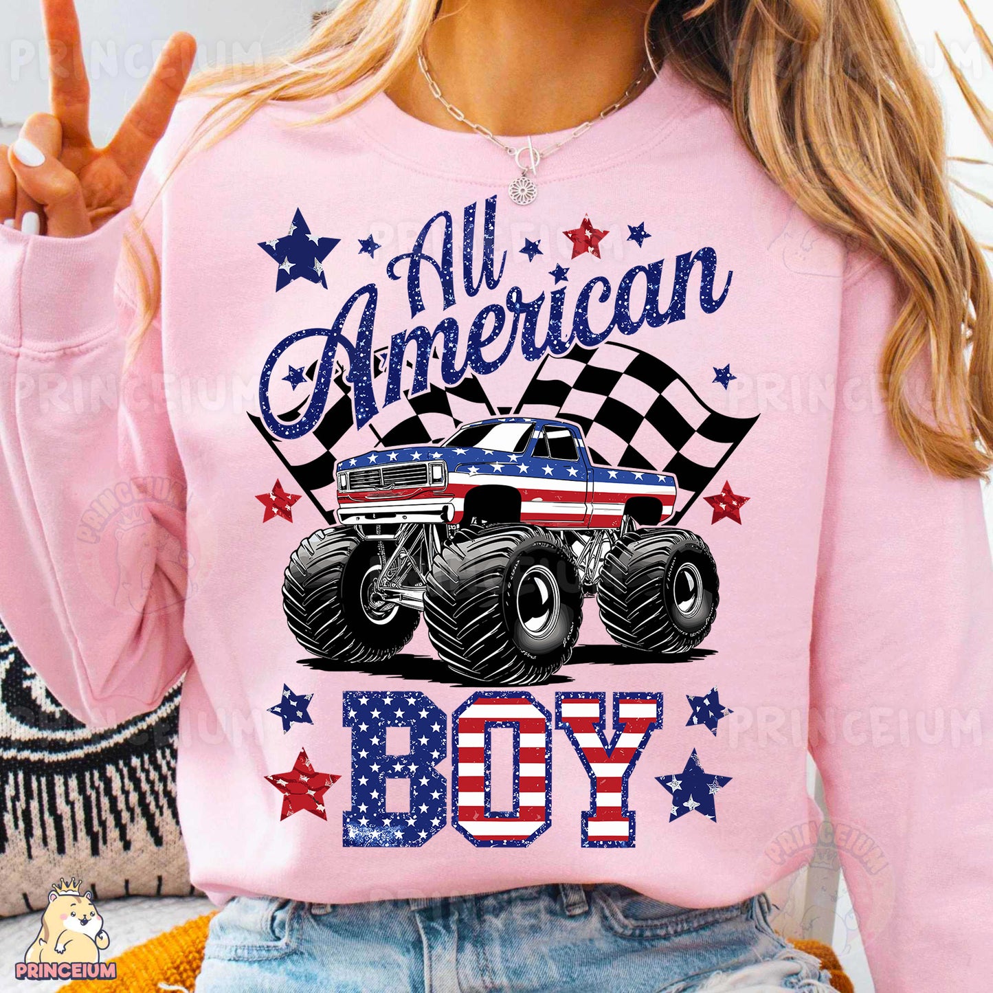a woman wearing a pink shirt with a monster truck on it