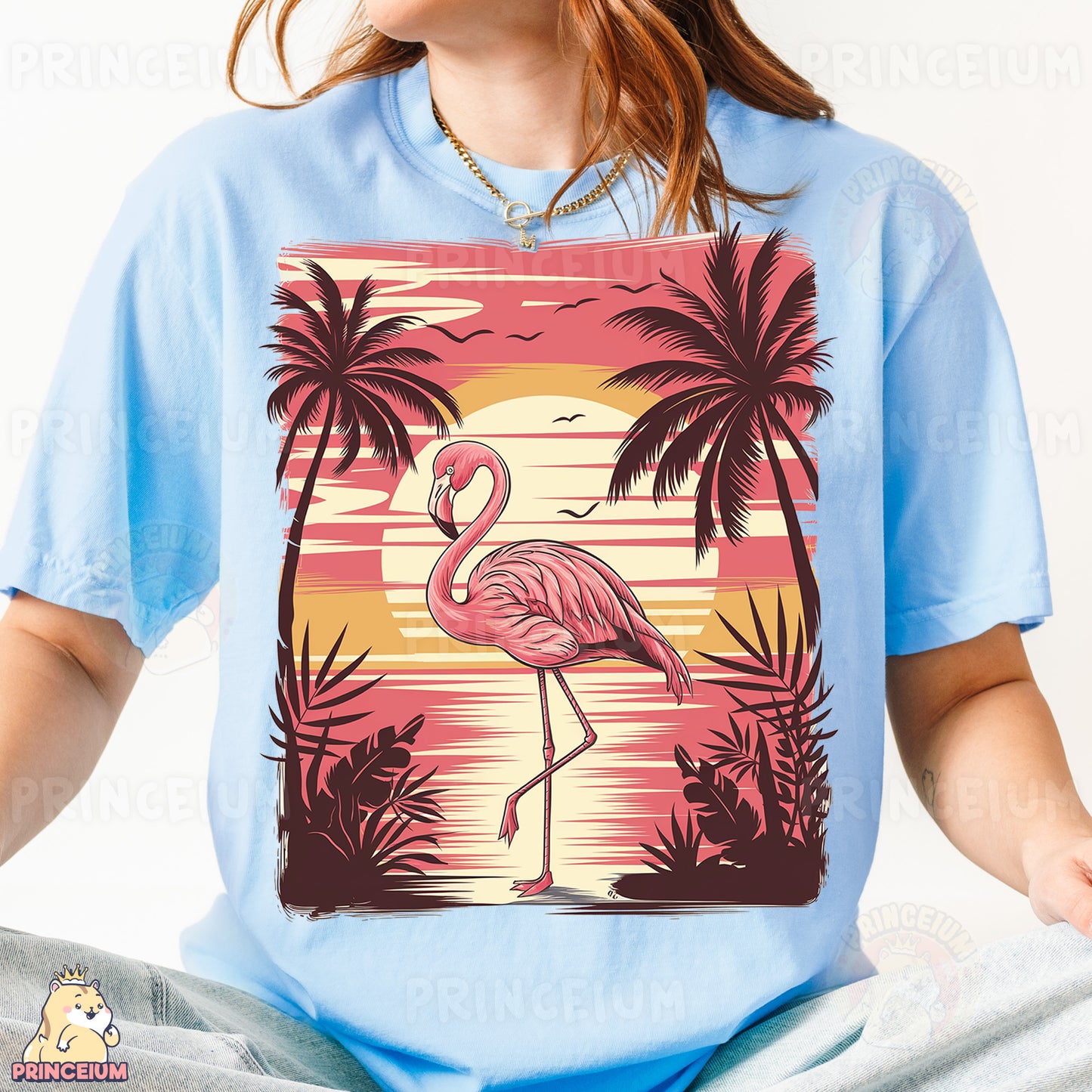 a woman wearing a blue shirt with a pink flamingo on it