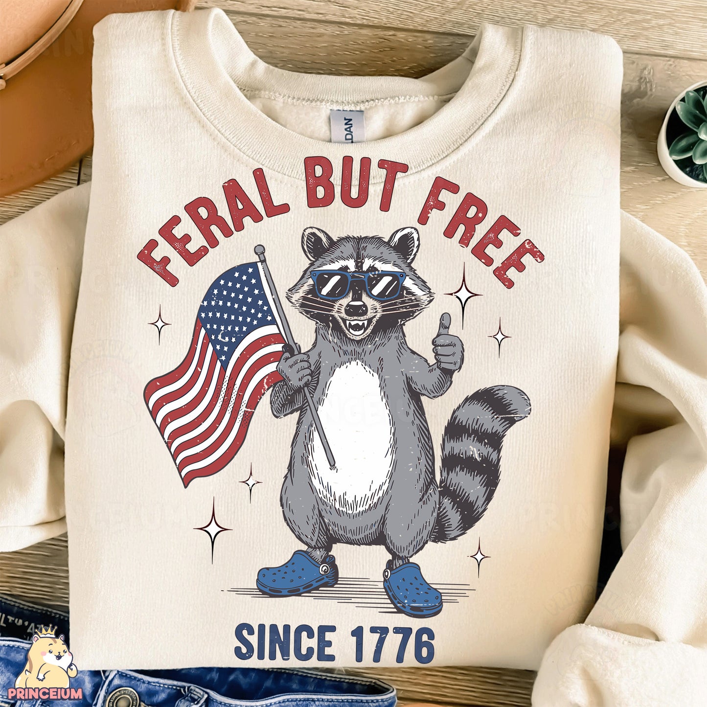 a shirt with a raccoon holding an american flag