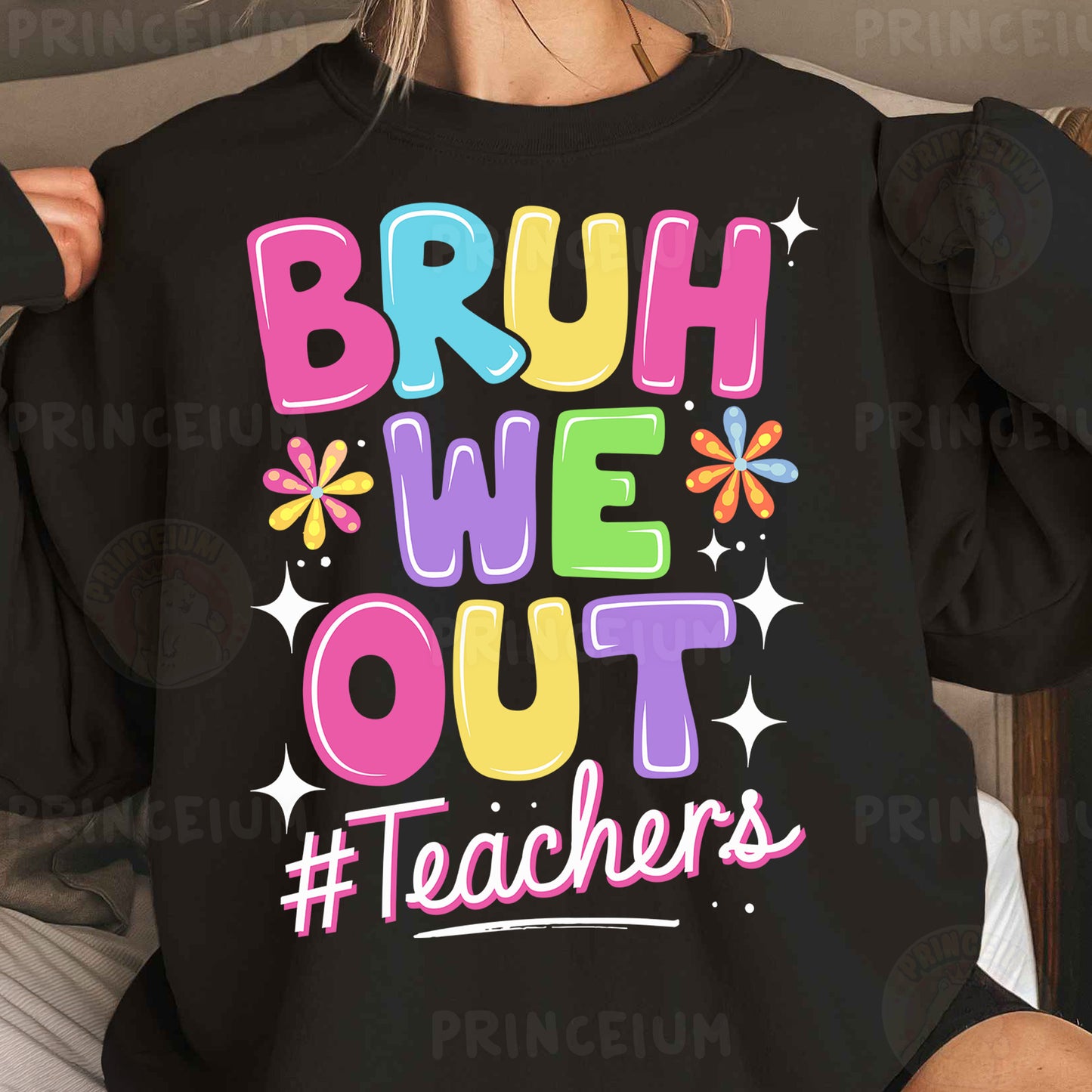 a woman wearing a black sweatshirt that says bruh we out teachers