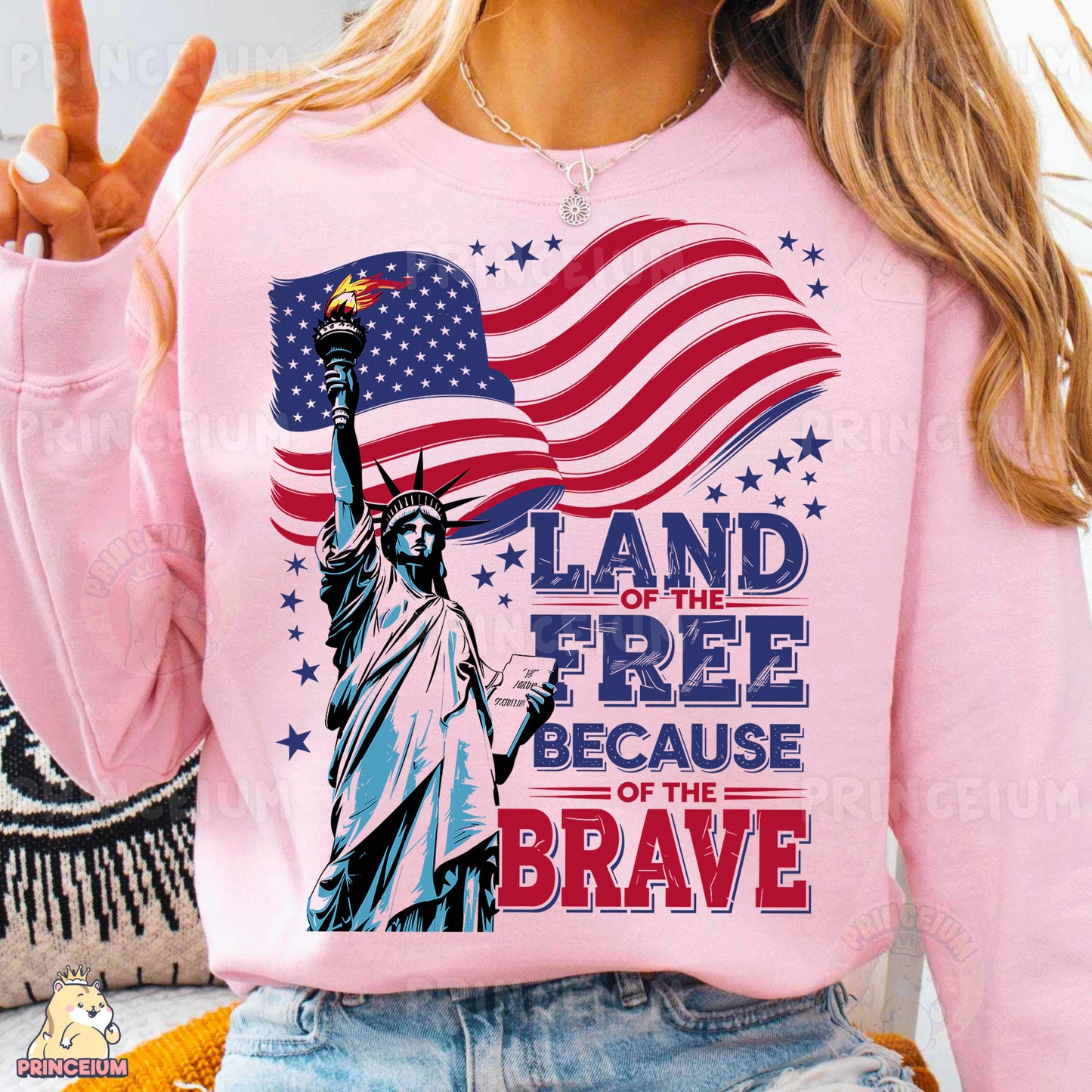 a woman wearing a pink shirt with the statue of liberty on it
