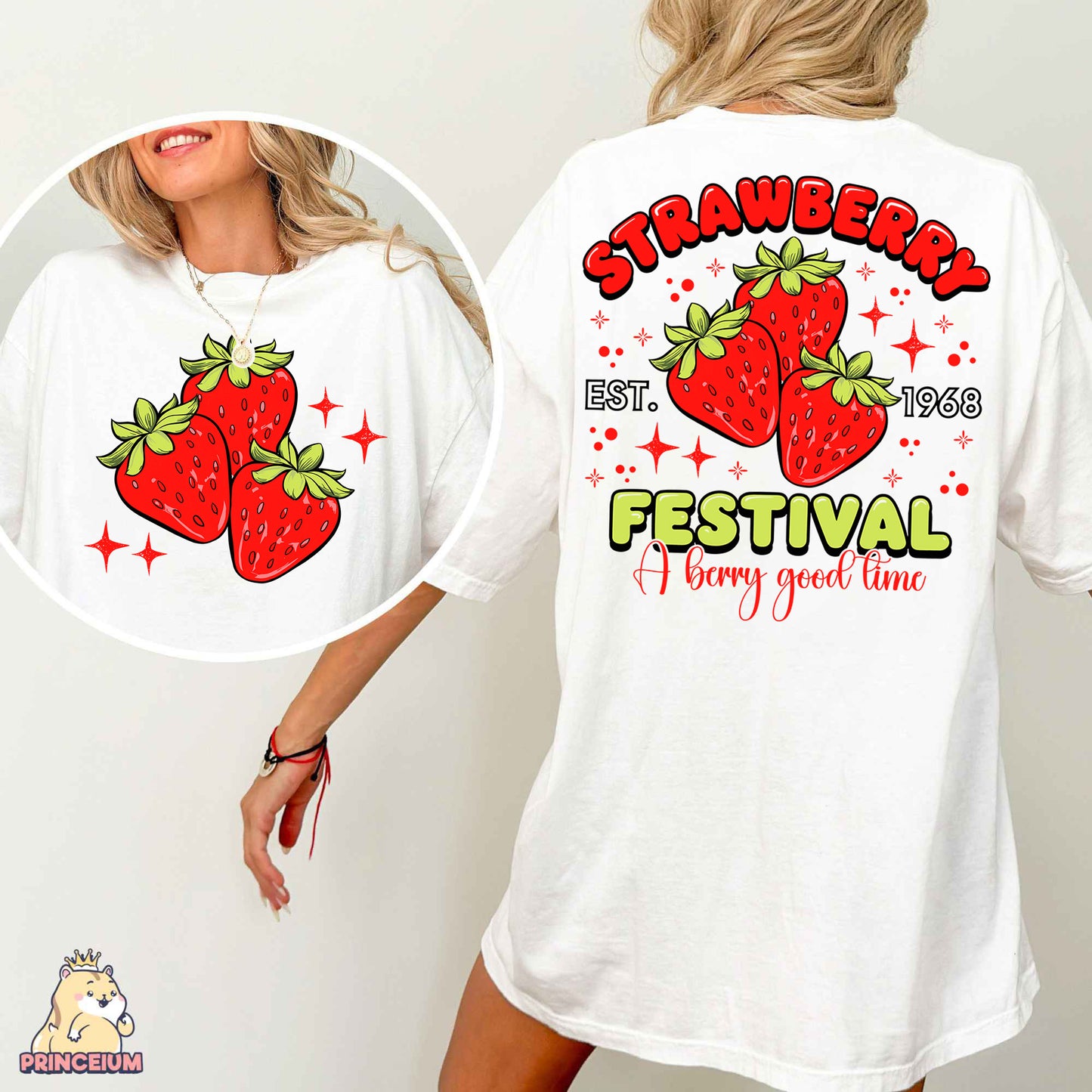 a woman wearing a white shirt with strawberries festival on it