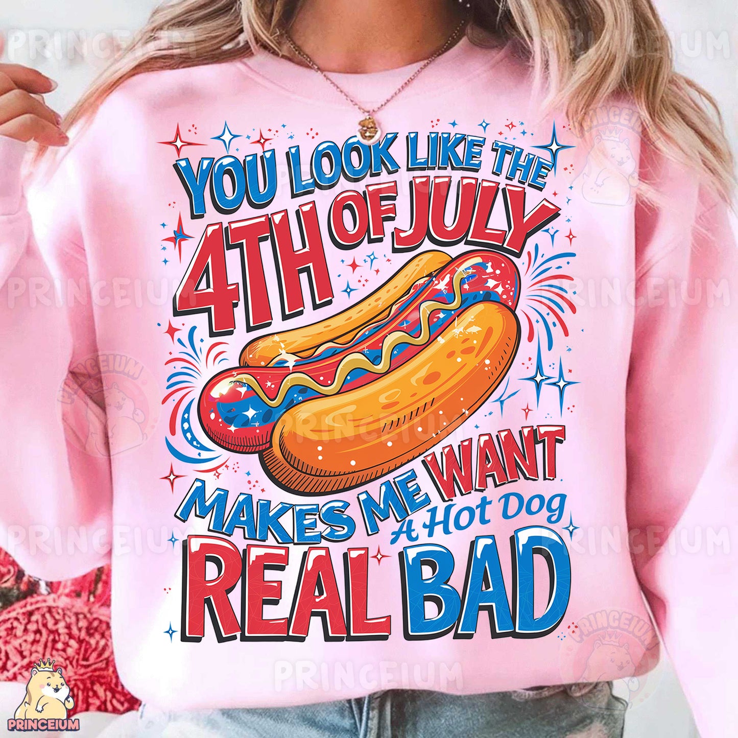 a woman wearing a pink shirt with a hot dog on it