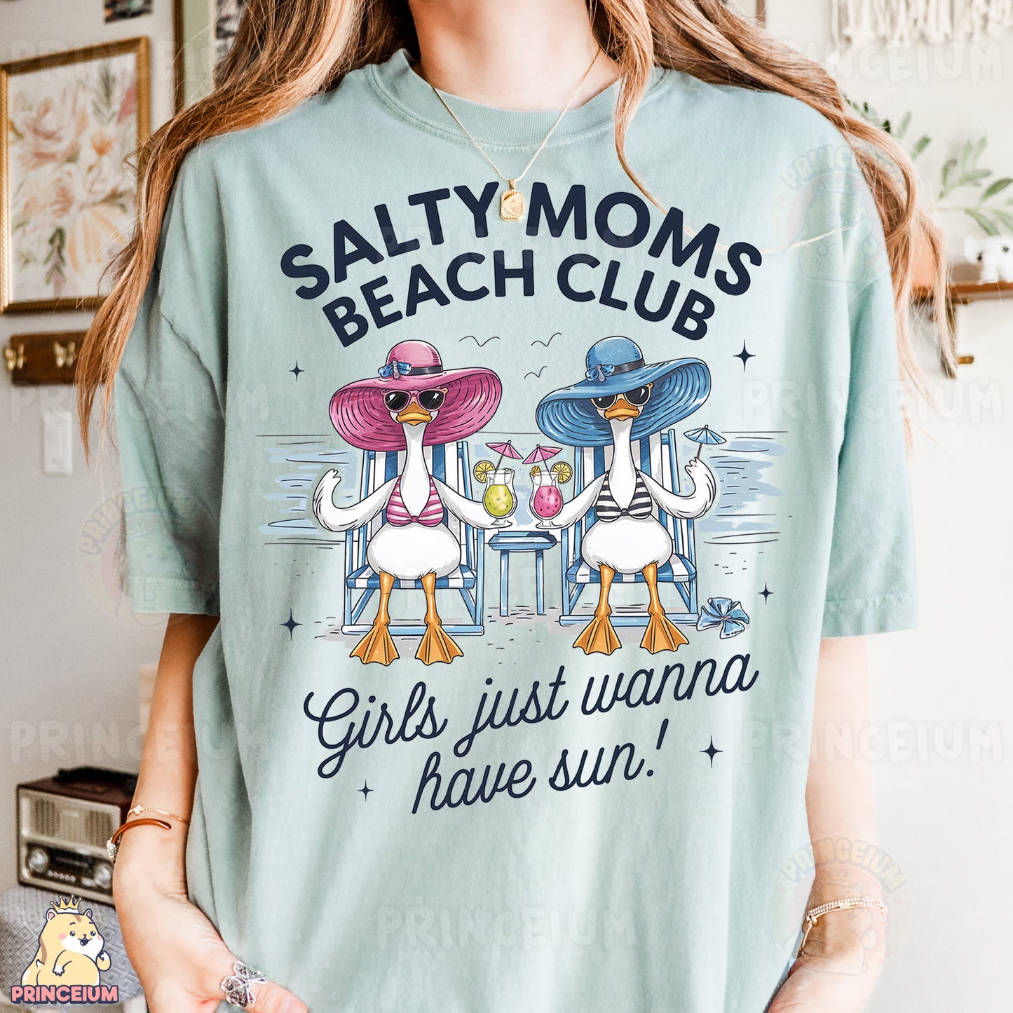a woman wearing a shirt that says salty moms beach club