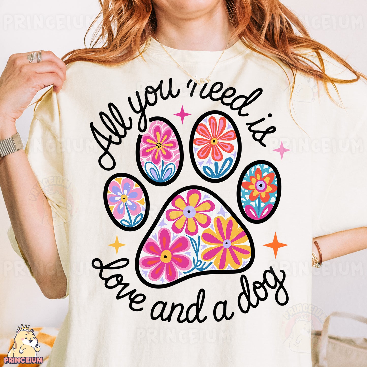 a woman wearing a t - shirt with a dog paw on it