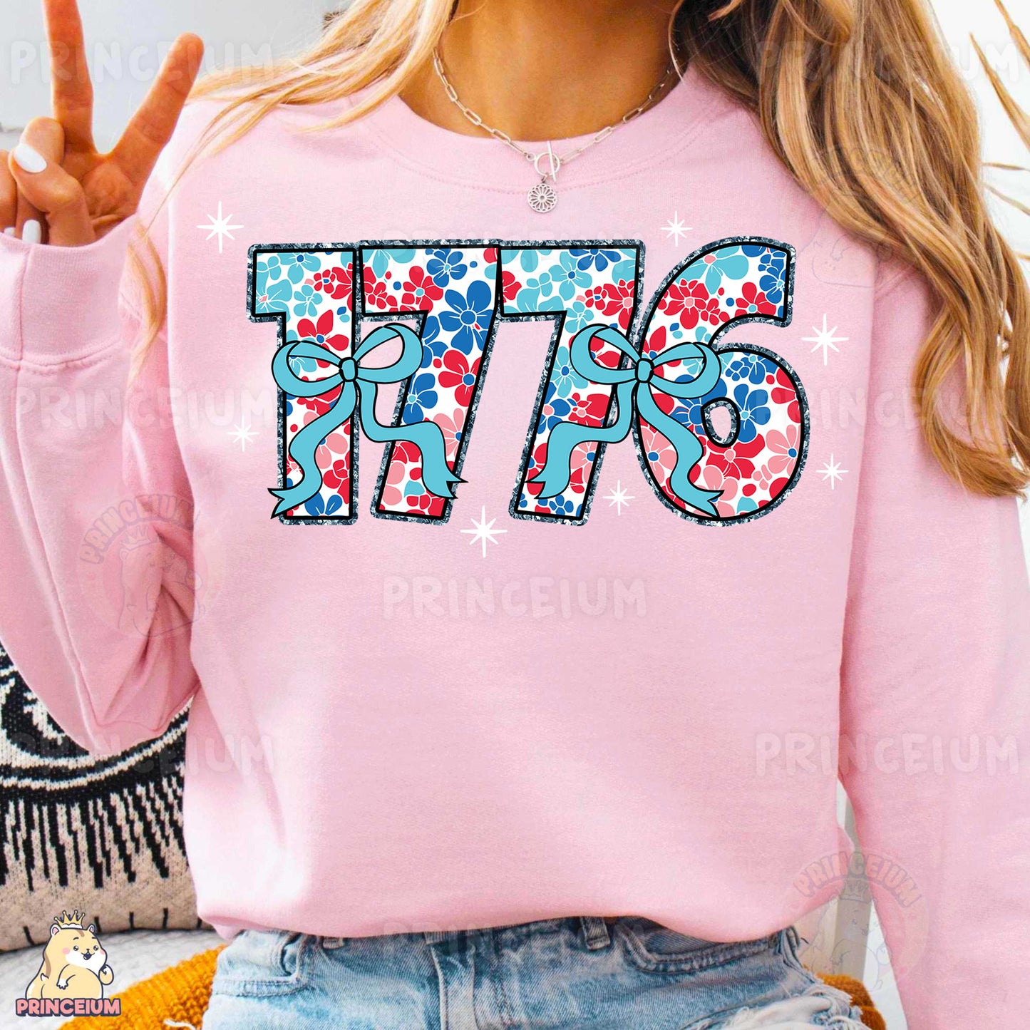 a woman wearing a pink sweatshirt with the number seventy on it