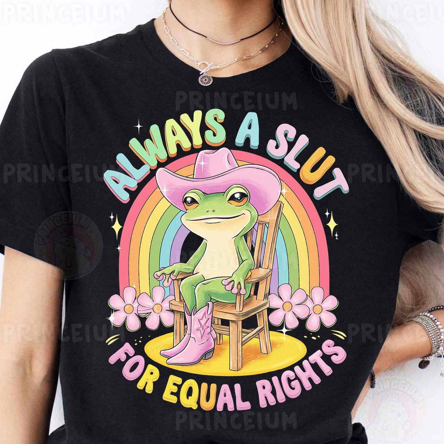 a woman wearing a black shirt with a frog wearing a cowboy hat