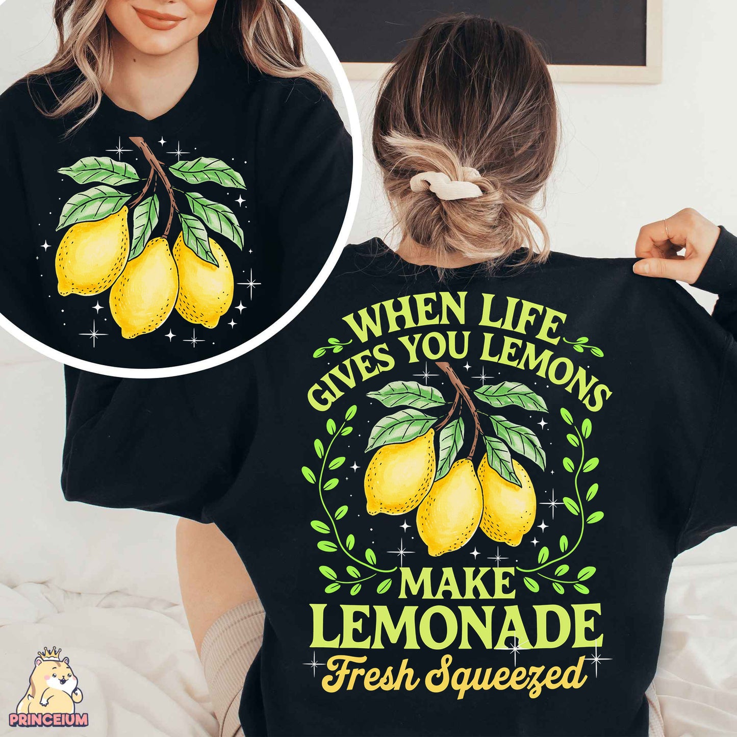 a woman wearing a black shirt with lemons on it