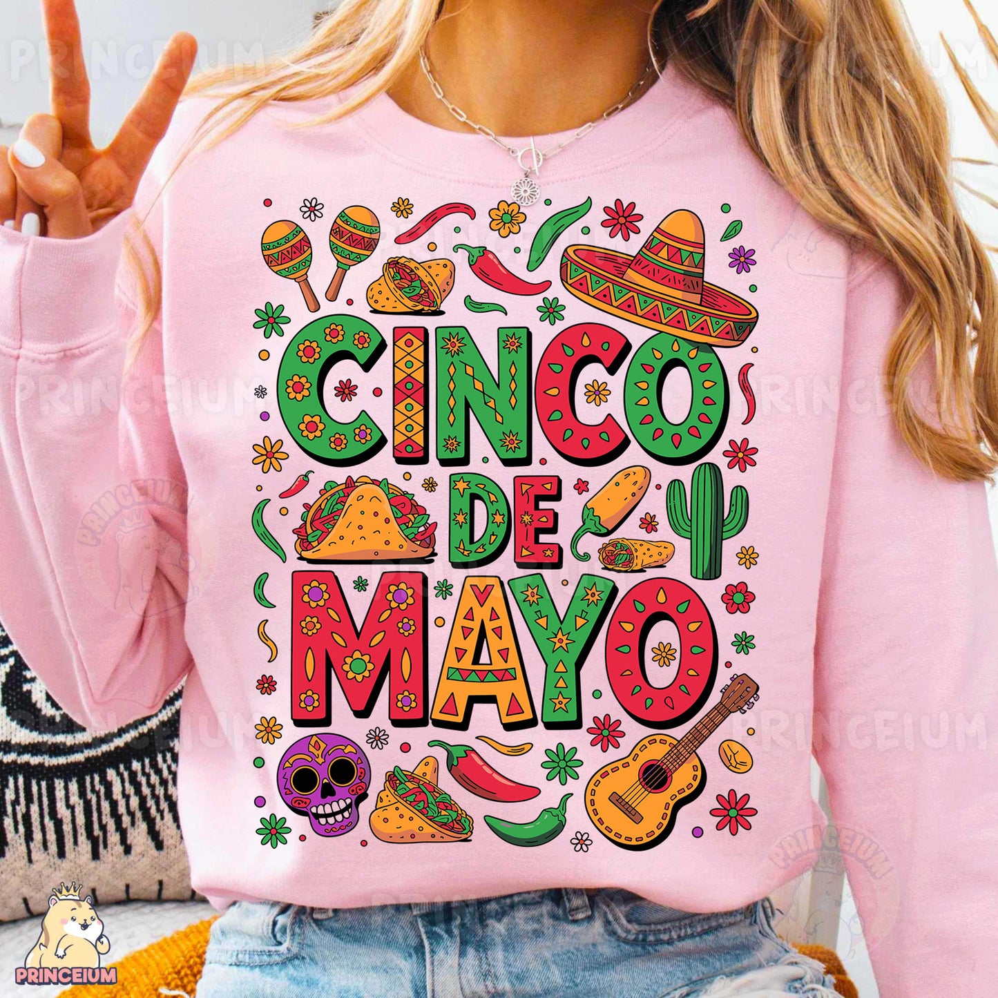 a woman wearing a pink shirt that says cinco de mayo