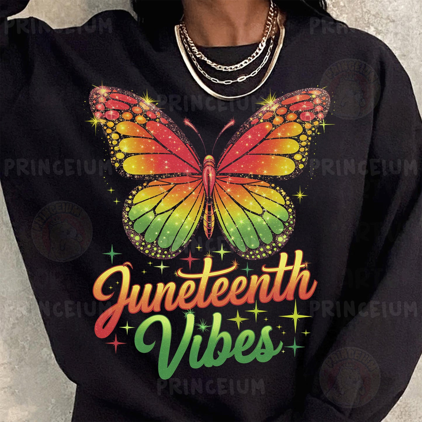 a woman wearing a black sweatshirt with a rainbow butterfly on it