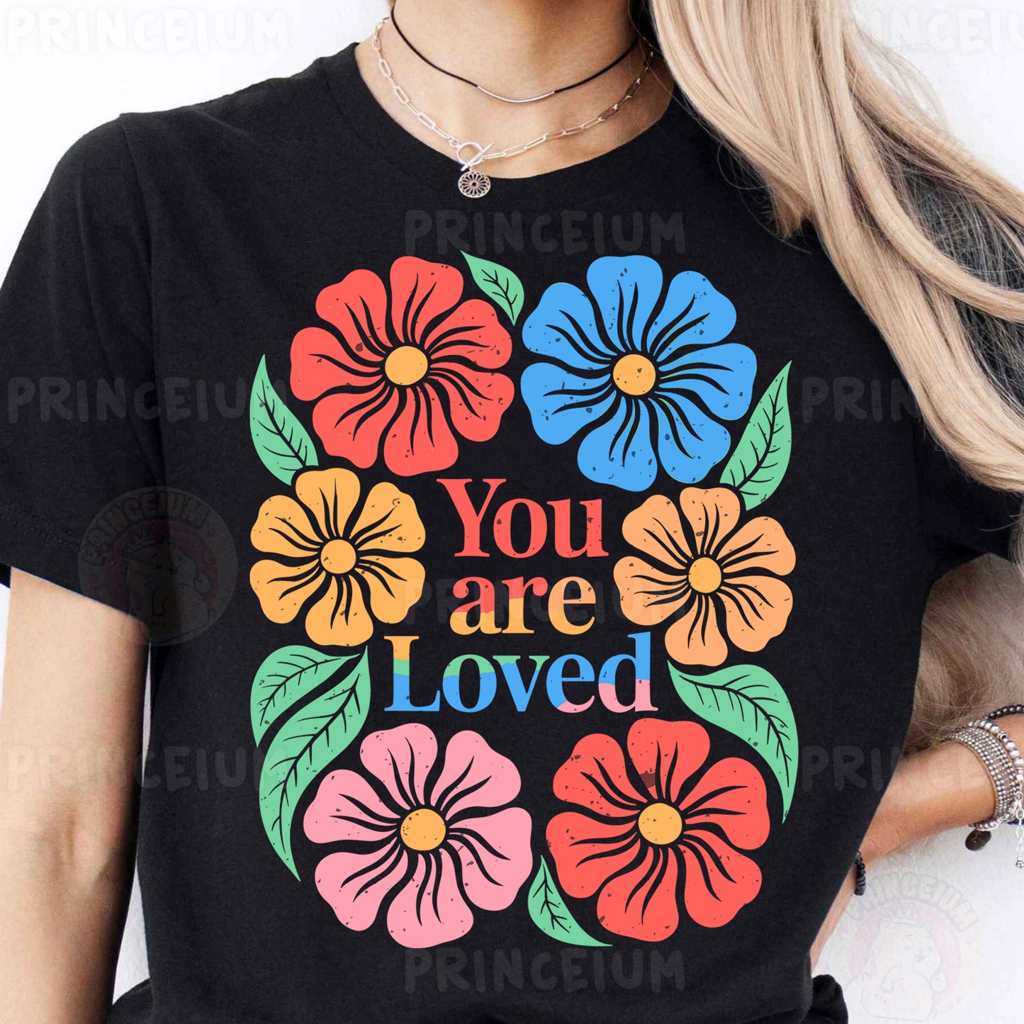 a woman wearing a t - shirt that says you are loved