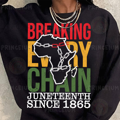 a woman wearing a black sweatshirt with the words breaking every chain on it
