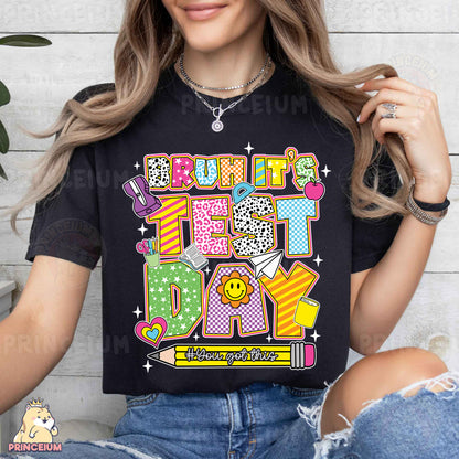 a woman wearing a black t - shirt with the words happy birthday on it