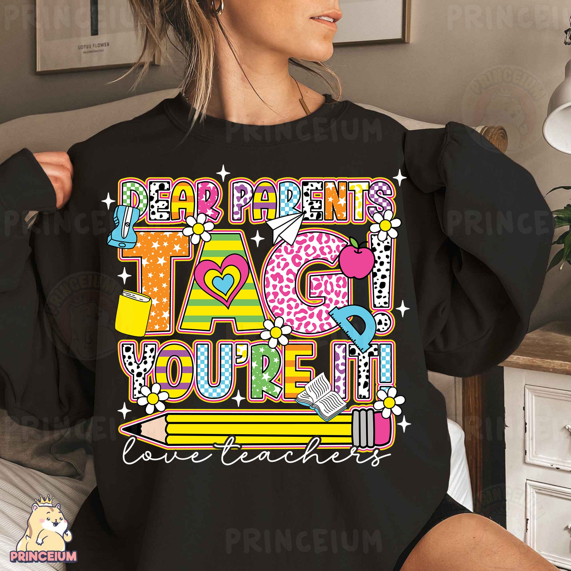 a woman wearing a black shirt that says happy birthday