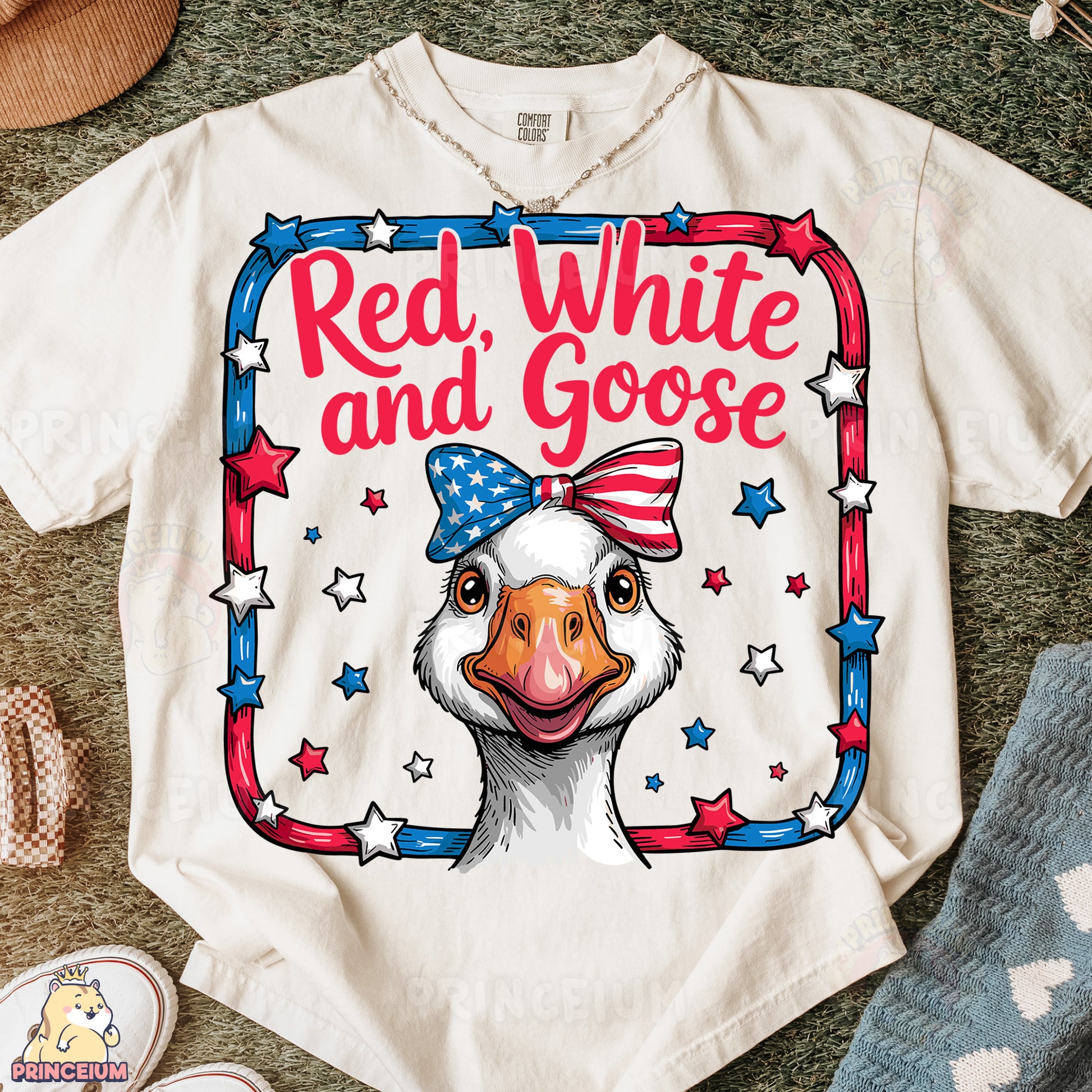 a red, white and goose t - shirt with a picture of a bald eagle