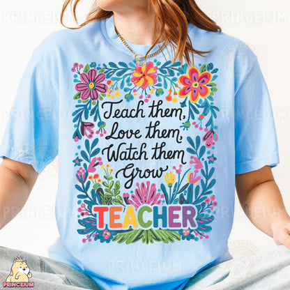 a woman wearing a t - shirt that says teach them, love them, watch