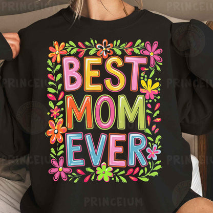a woman wearing a black best mom ever sweatshirt