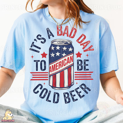 a woman wearing a blue shirt with a can of beer on it