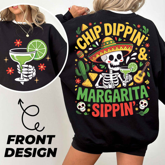 a woman wearing a black sweatshirt with a skeleton wearing a sombrero and a