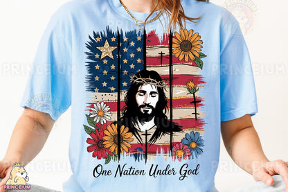 a woman wearing a blue shirt with a picture of jesus on it
