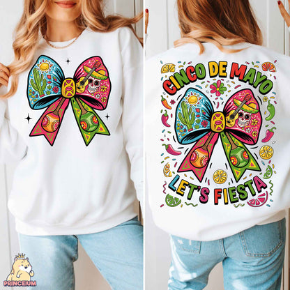 a woman wearing a white sweatshirt with a colorful bow