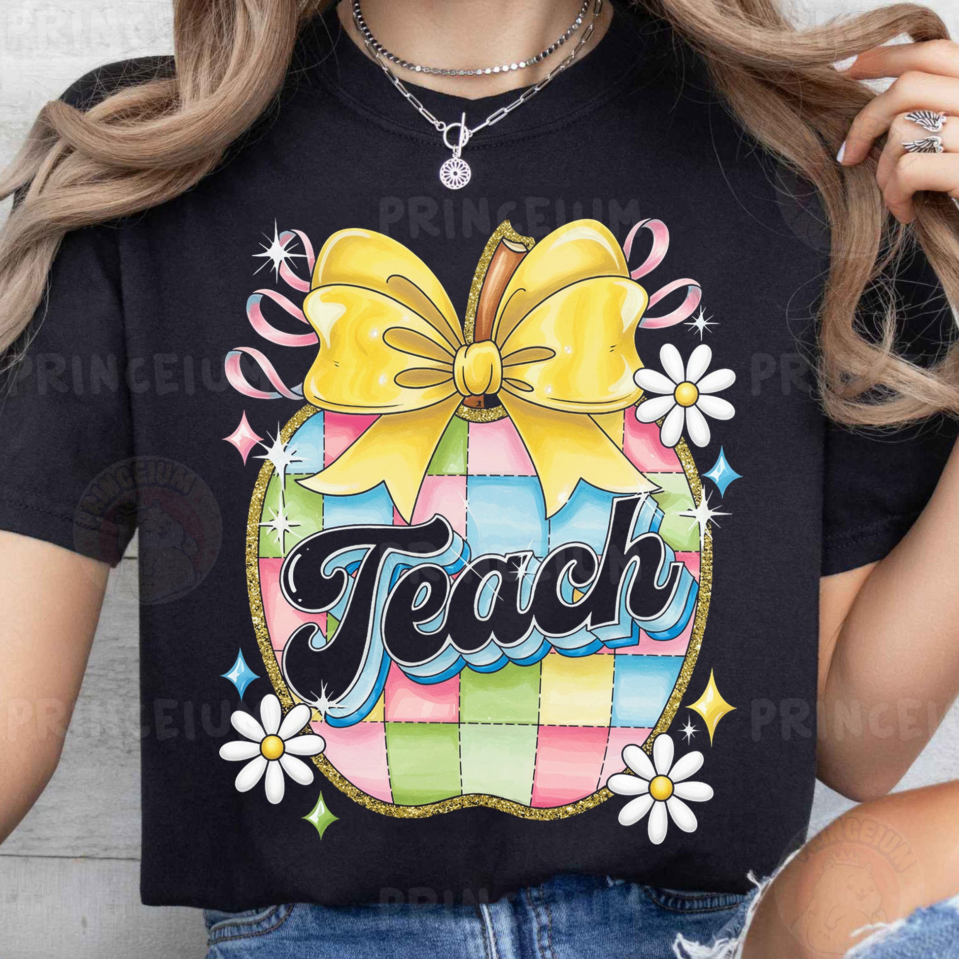 a woman wearing a teacher shirt with a bow