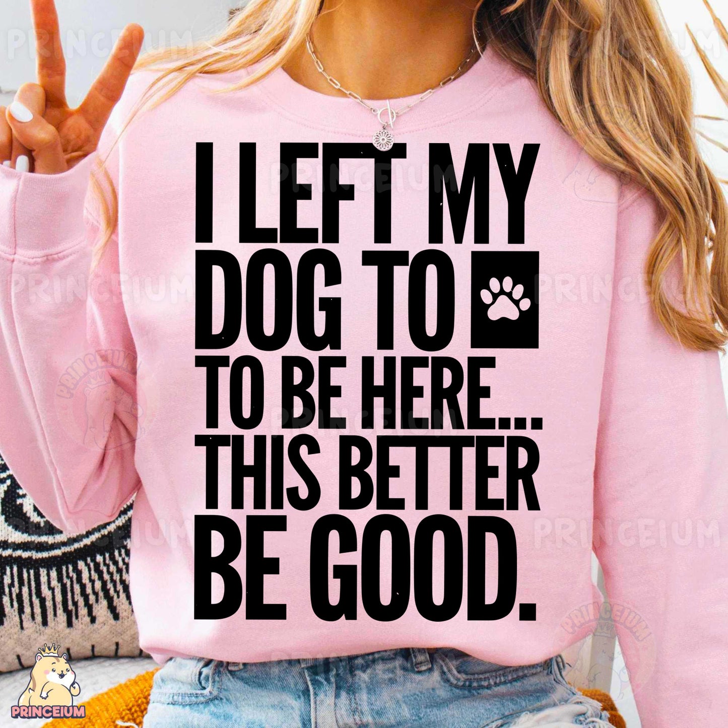 a woman wearing a pink shirt that says, i left my dog to be here