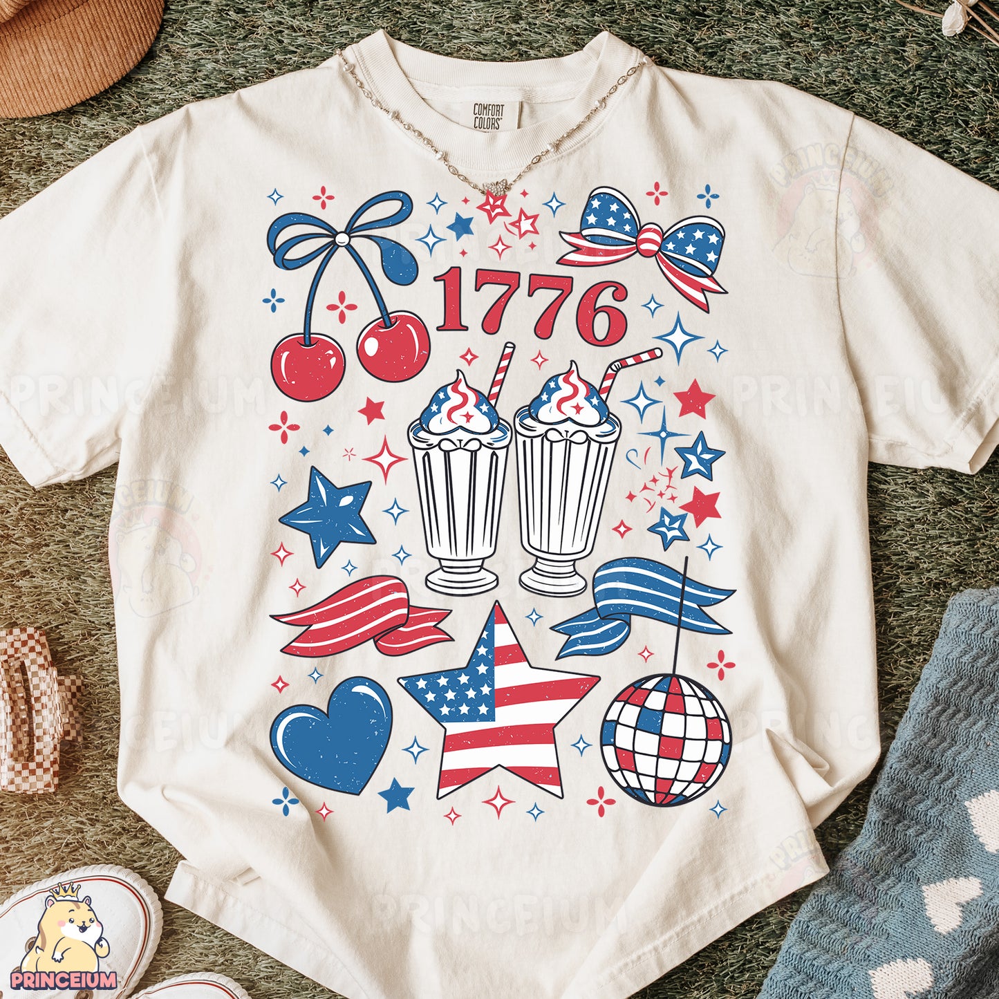 a t - shirt with an image of a cupcake, cherries, stars