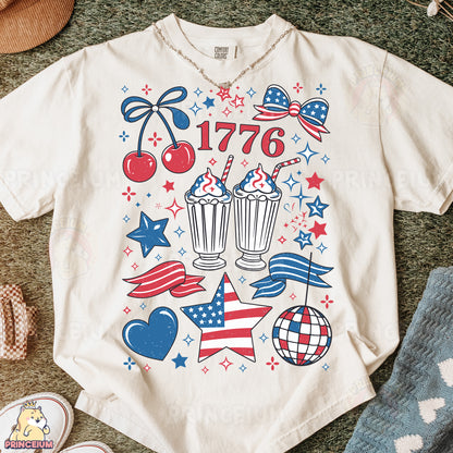 a t - shirt with an image of a cupcake, cherries, stars